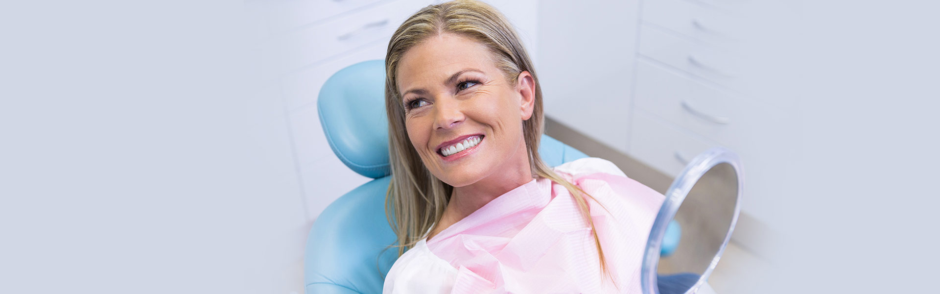 patient smiling after dental implant treatment